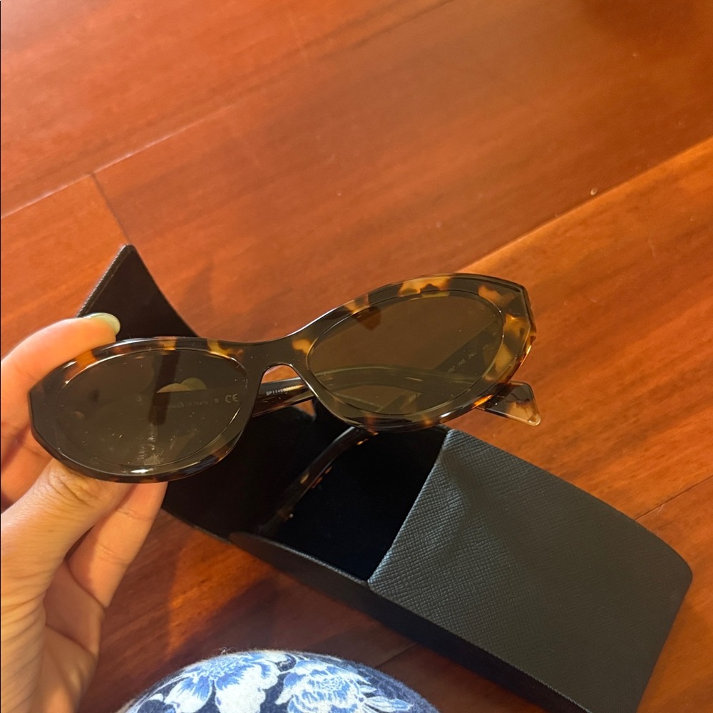 Prada Tortoiseshell Oval Sunglasses with Brown Lenses